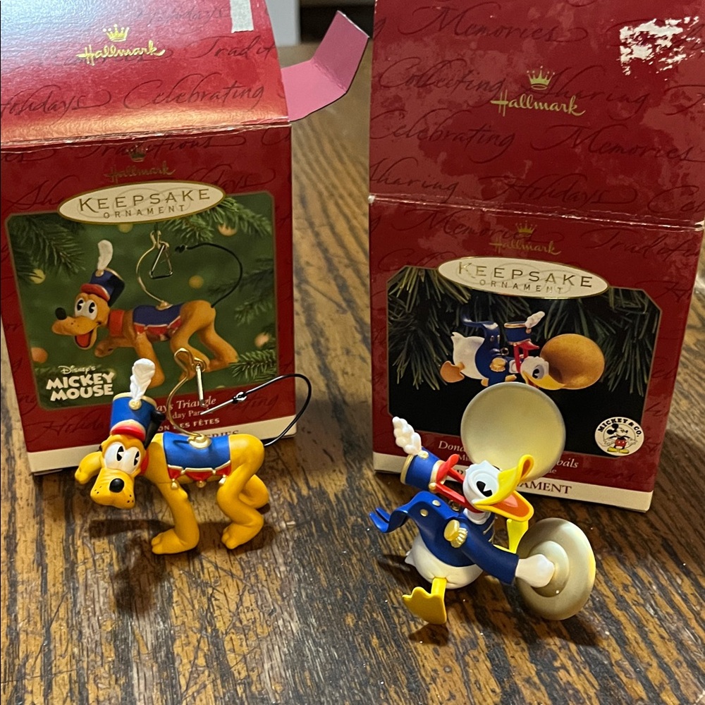 Vintage hallmark keepsake Disney ornaments 
Pluto & Donald